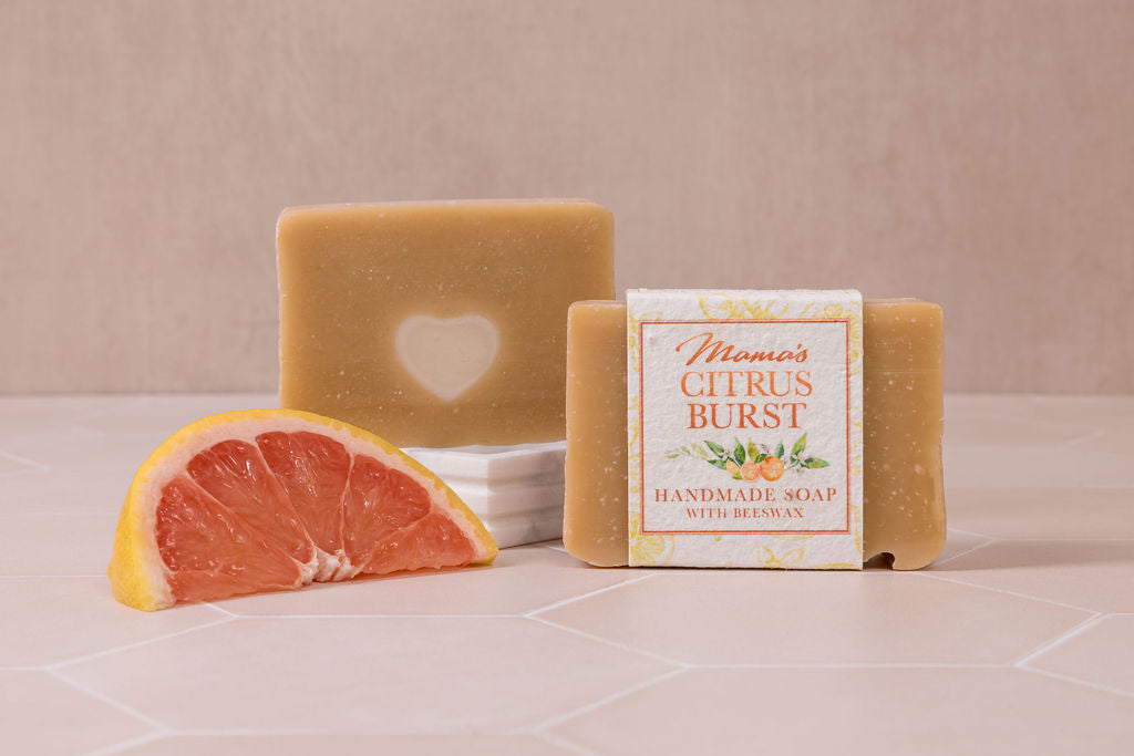 handmade beeswax grapefruit and lemongrass soap, with a seeded paper label