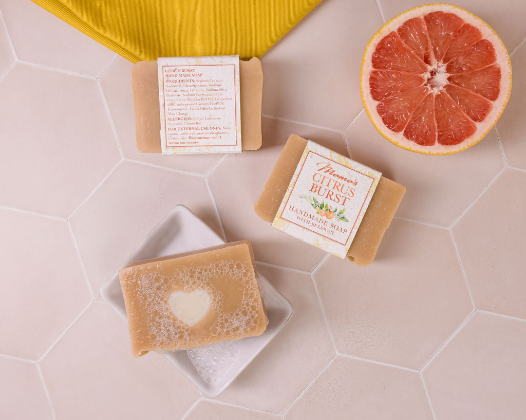 handmade beeswax grapefruit and lemongrass soap, with a seeded paper label