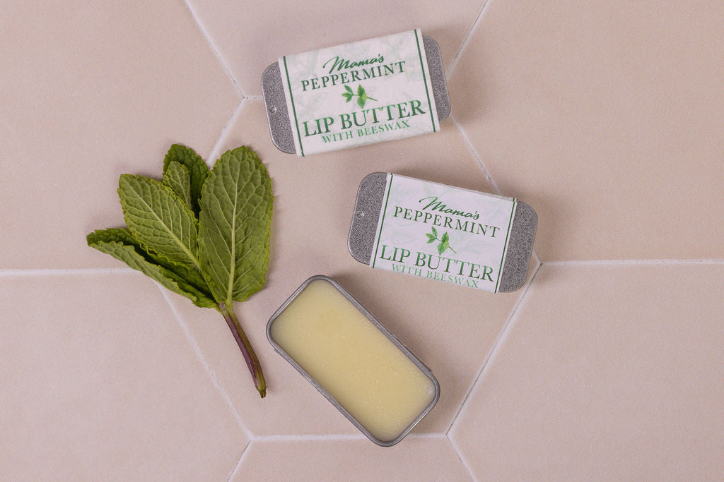 lip butter with beeswax and  peppermint in plastic-free packaging and a seeded paper label