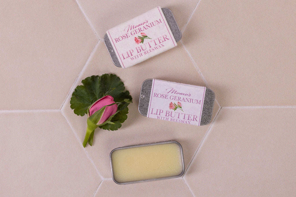 lip butter with beeswax and  rose geranium in plastic-free packaging and a seeded paper label