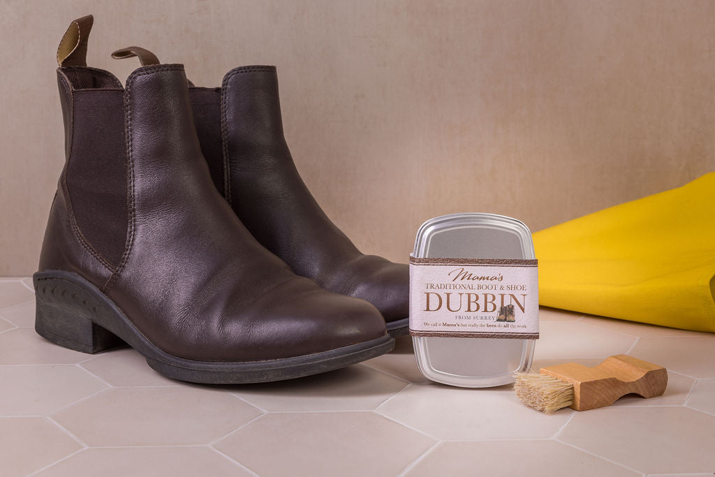 Mama's handmade dubbin with beeswax and beef tallow for conditioning & protecting leather in a recyclable tin