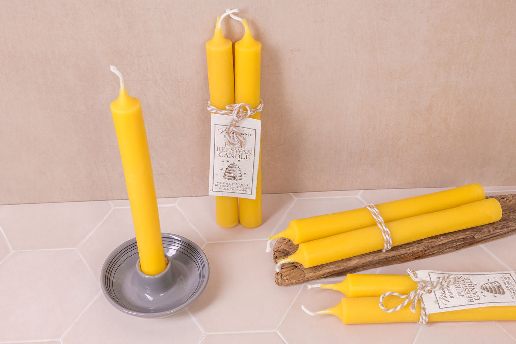 Elegant long-burning beeswax candles with a seeded paper label to grow wildflowers