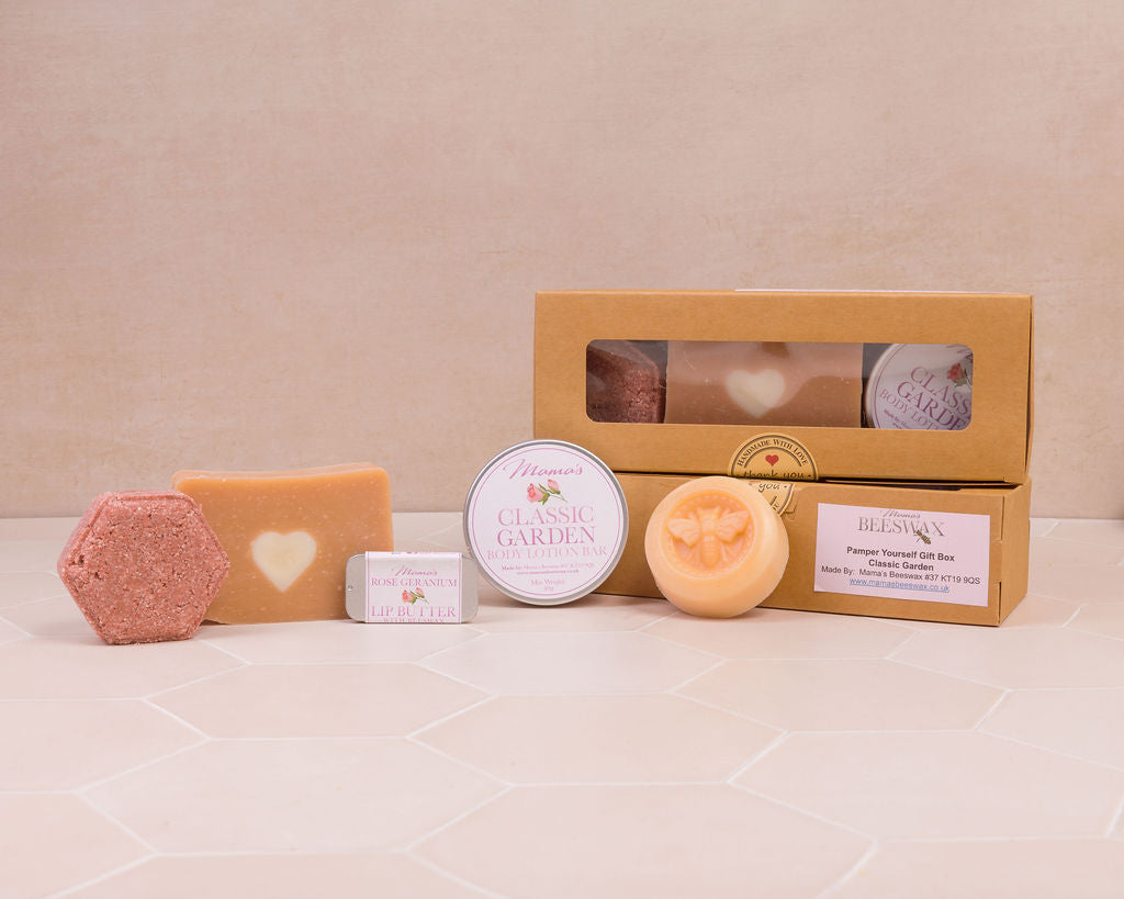 Eco-friendly floral skincare gift box with soap, lotion bar, scrub & lip butter
